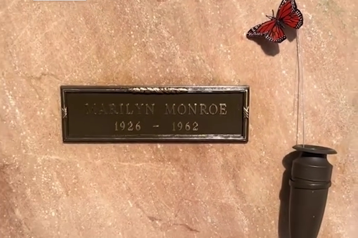 Leaving a Gift at Marilyn Monroe's Grave